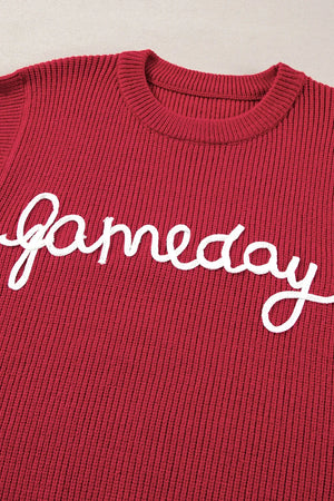 Burgundy ribbed knit vest with white "gameday" appliqué and crew neck.