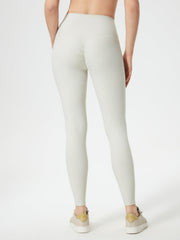 Ribbed high-waist leggings in light gray with ruched detail on the back.