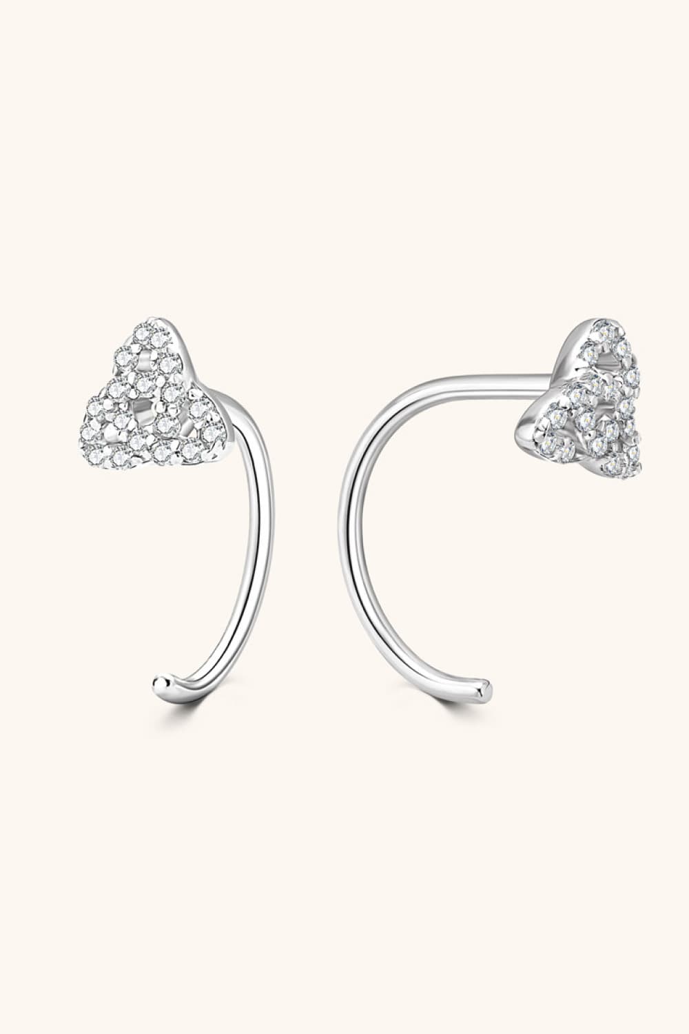 Silver diamond-dusted crescent ear climbers with heart-shaped tops