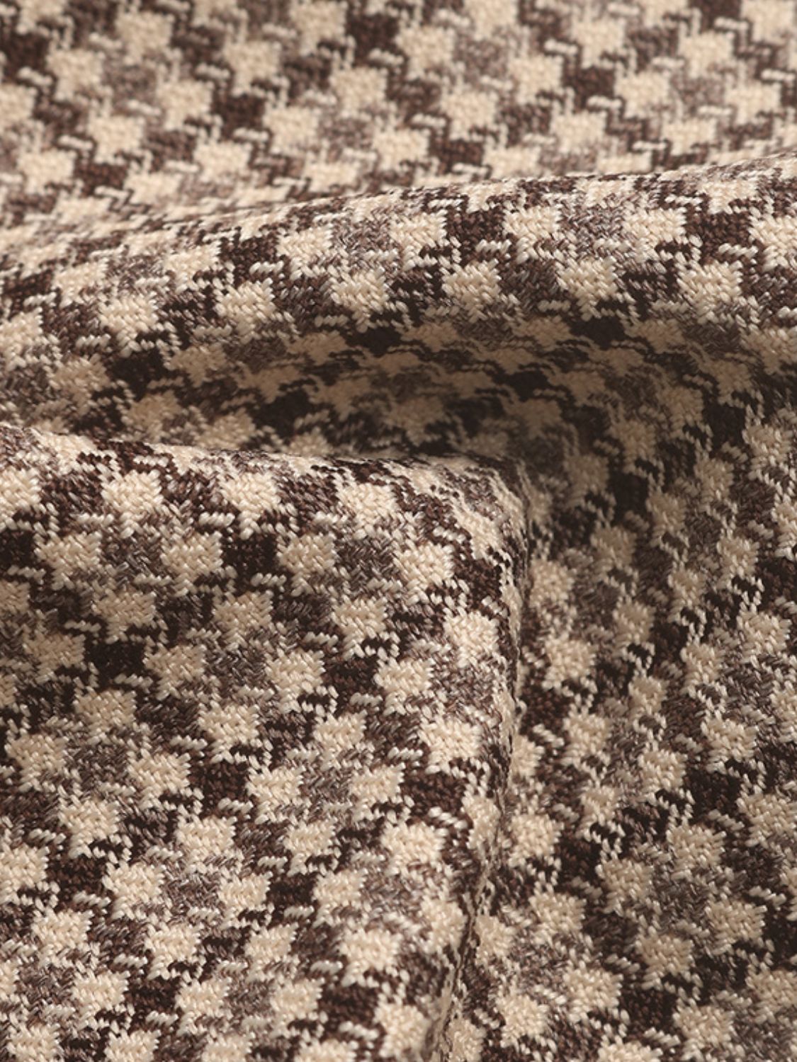 Houndstooth double-breasted blazer in camel with a textured weave.
