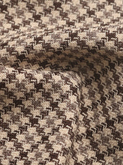 Houndstooth double-breasted blazer in camel with a textured weave.