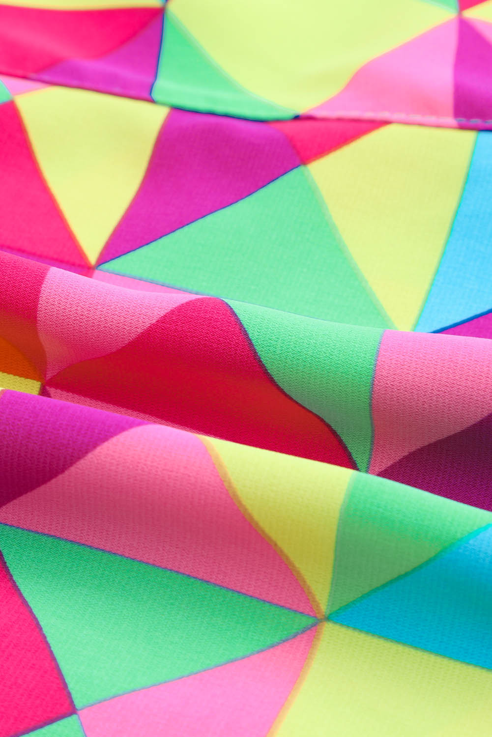 Geometric Prism Running Shorts in multicolor with a vibrant block pattern.