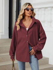 Burgundy oversized corduroy shirt jacket with button front and collar