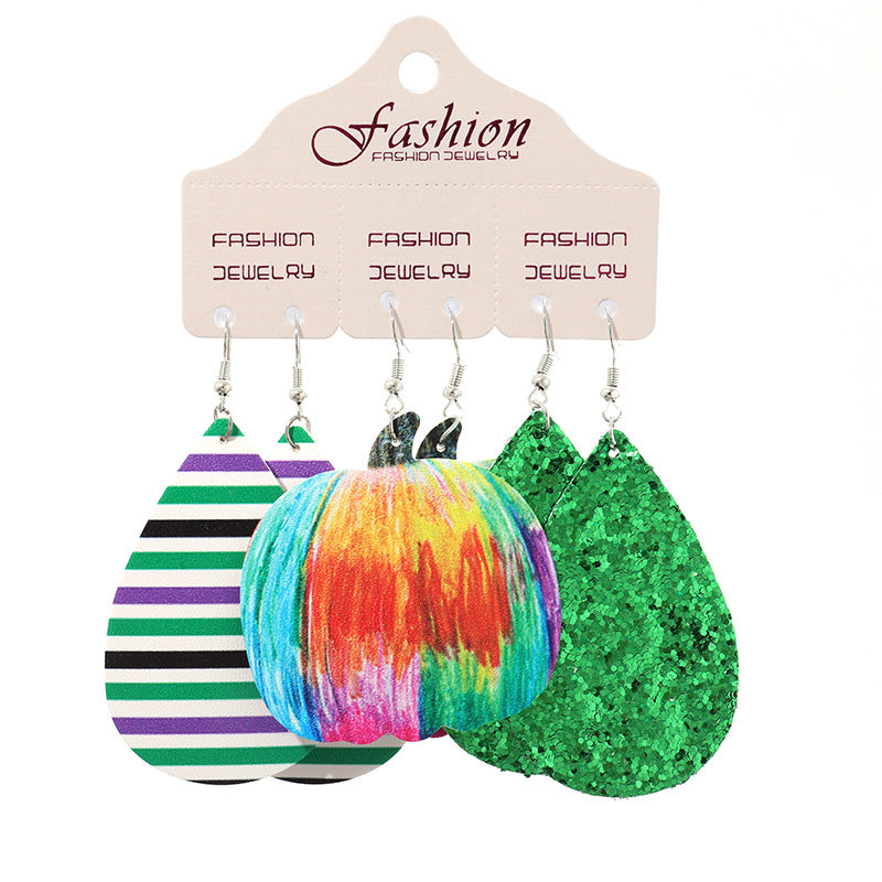 Halloween dangle earrings set with striped, pumpkin, and glitter green teardrop designs.