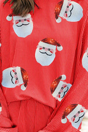 Red sequin Santa pleated co-ord set with vertical stripes.