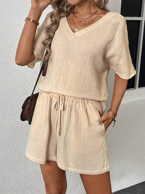Textured gauze lounge set in tan, featuring a V-neck top and drawstring shorts.