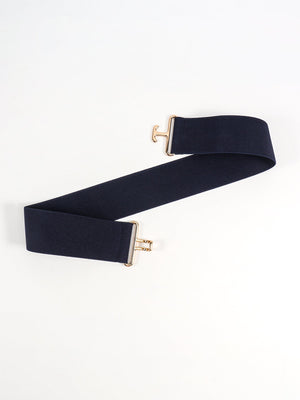 Dark blue elastic belt with gold sculpted buckle detail