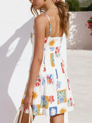 Vibrant floral print mini dress with tie-front detail, A-line cut, and spaghetti straps.