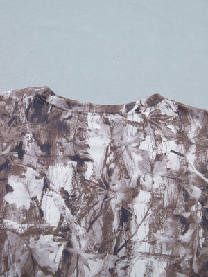 Woodland camouflage tunic with crew neck and drop shoulders.