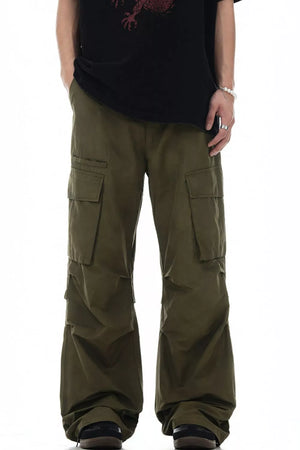 Olive green relaxed fit cargo pants with multiple pockets and a casual style.