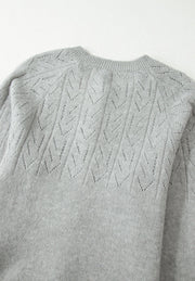 Gray lace-effect knit cardigan with chevron pattern and crew neck