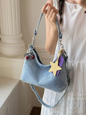 Star Charm Denim Shoulder Bag in Medium, model styling view
