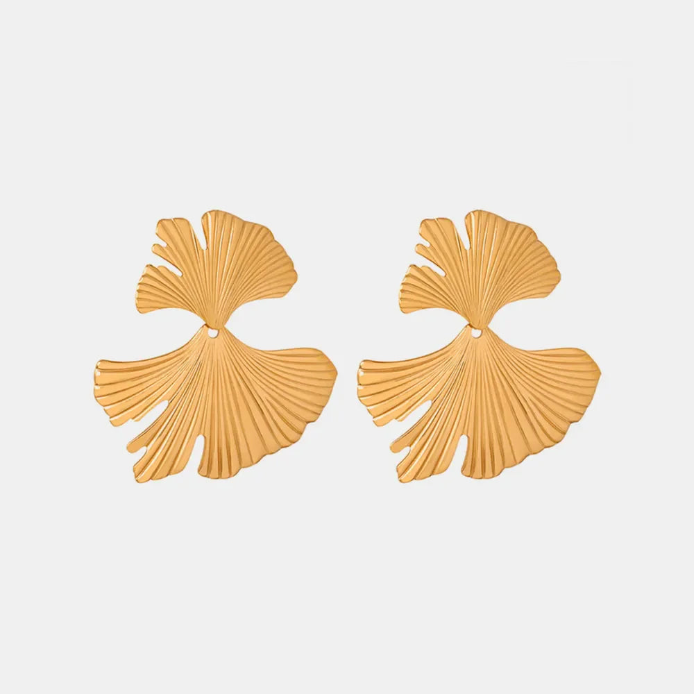 Gold Ginkgo leaf statement earrings with detailed veins, a boho chic accessory.
