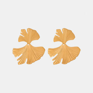 Gold Ginkgo leaf statement earrings with detailed veins, a boho chic accessory.