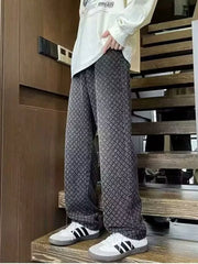 Black geometric print relaxed wide-leg jeans with a casual, chic style.