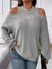 Gray ribbed mock neck cold shoulder knit top with long sleeves.