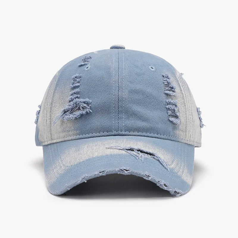 Light blue shredded canvas baseball cap with distressed details.