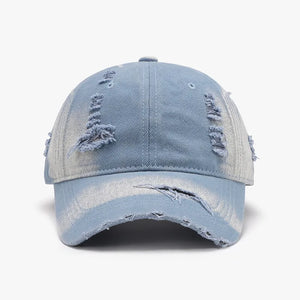 Light blue shredded canvas baseball cap with distressed details.