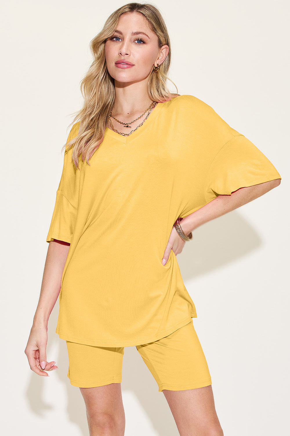 Yellow bamboo loungewear set with relaxed fit v-neck tee and biker shorts