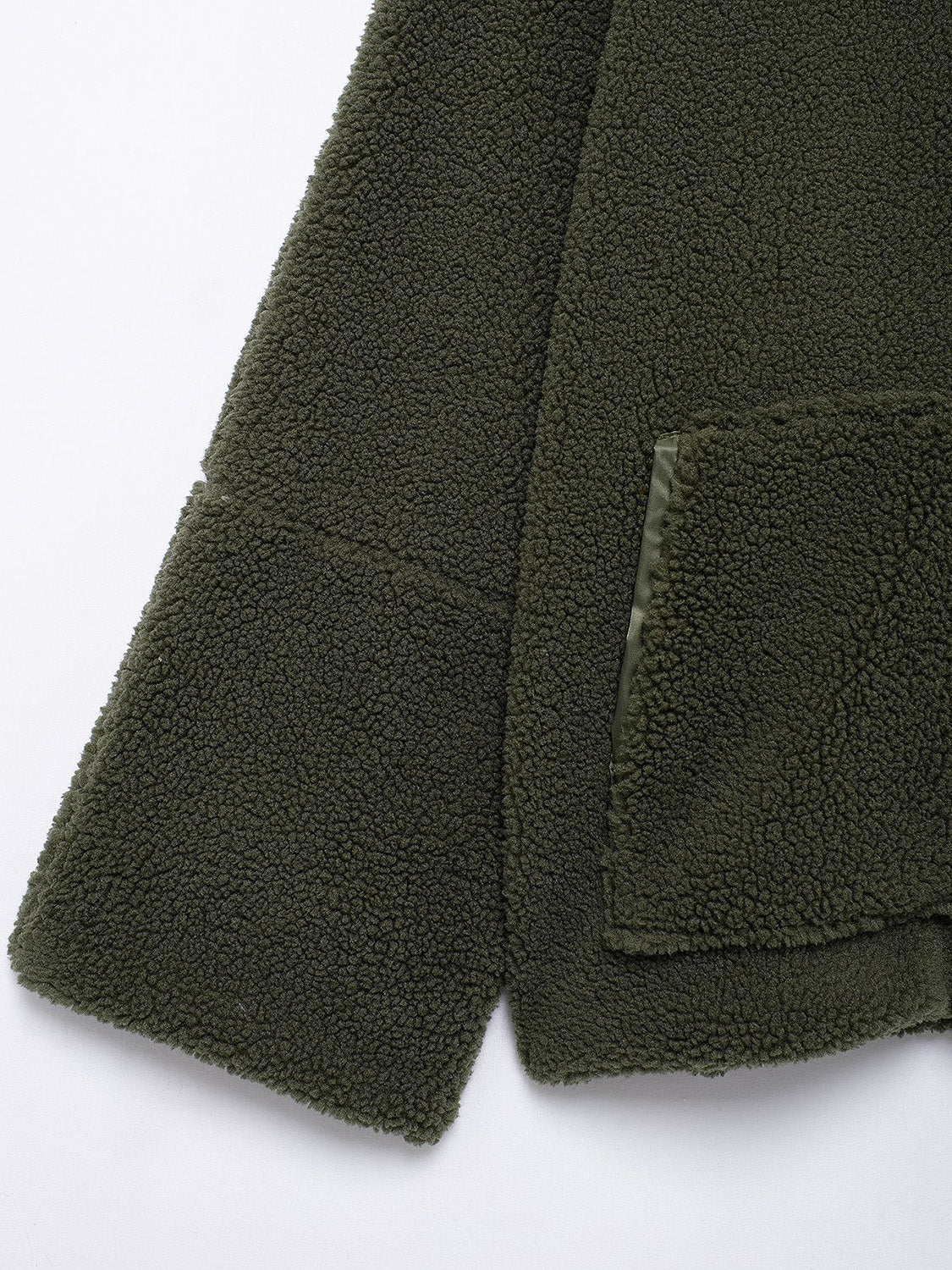 Olive green sherpa jacket with a textured fleece fabric and a patch pocket detail.