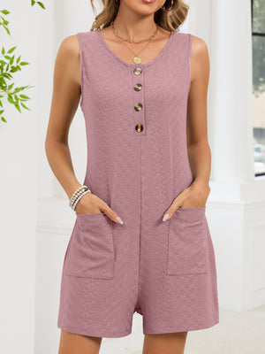Pink buttoned sleeveless romper with textured fabric and patch pockets.