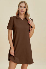 Brown textured short sleeve V-neck mini dress with geometric pattern.