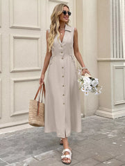 Beige midi dress with adjustable ties, collared neckline, and button-down front.