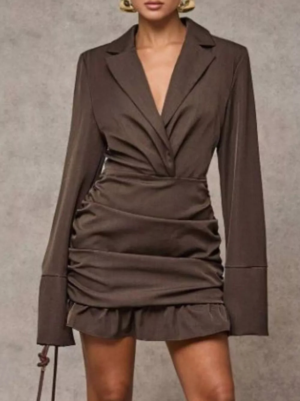 Brown ruched blazer dress with ruffled hem and deep V-neck.