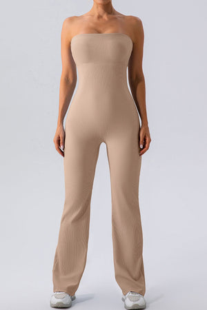 Camel ribbed bandeau flare leg jumpsuit with a seamless fit.