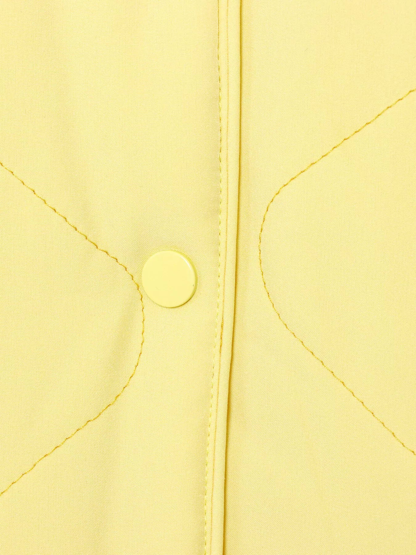 Yellow quilted puffer jacket with snap button detail and contrast stitching.