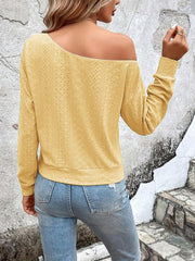 Yellow off-shoulder eyelet knit top with long sleeves