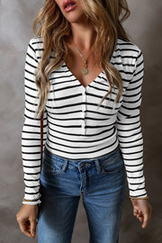 Ribbed stripe henley top in black and white with button detail and V-neck.