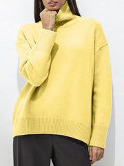Relaxed fit ribbed turtleneck sweater in Canary Yellow acrylic with ribbed cuffs and hem.