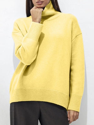 Relaxed fit ribbed turtleneck sweater in Canary Yellow acrylic with ribbed cuffs and hem.