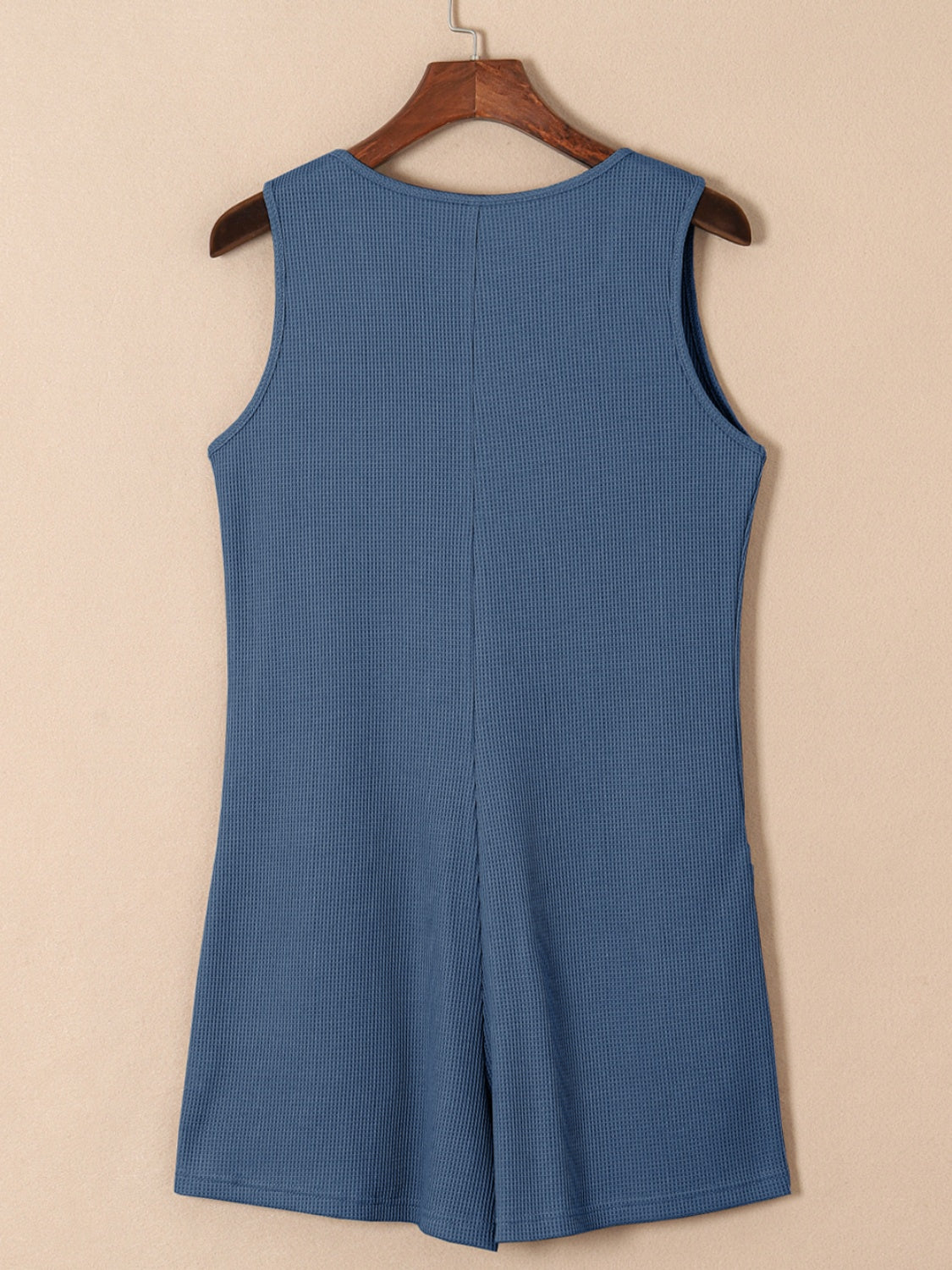 Dusty Blue waffle knit button-down romper with pockets, sleeveless, round neck