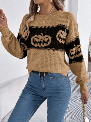 Camel acrylic sweater with jack-o'-lantern intarsia pattern and crew neck.