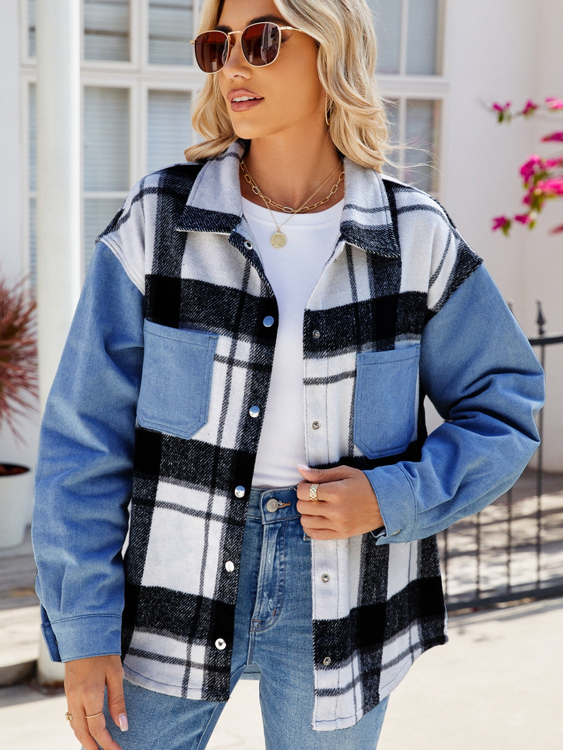 Colorblock plaid denim shacket in dusty blue with button front and chest pockets.