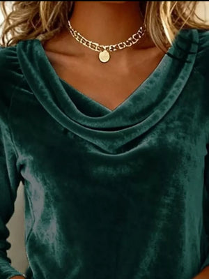 Green velvet cowl neck t-shirt with long sleeves and a draped neckline.