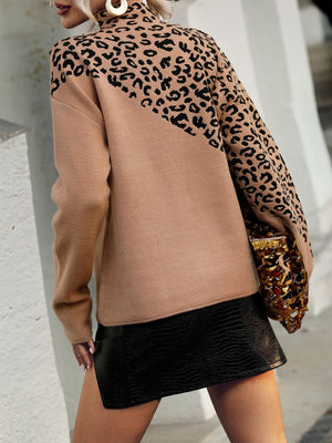 Khaki mock neck knit sweater with leopard print panels on shoulders and sleeves.