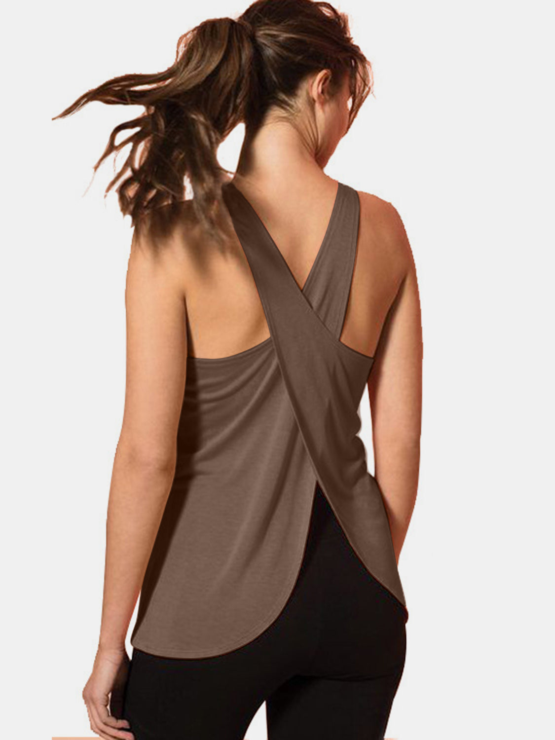 Mocha flowy tank top with criss-cross back straps and a curved hem.
