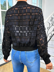 Black bomber jacket with sheer textured gridwork pattern and ribbed cuffs.