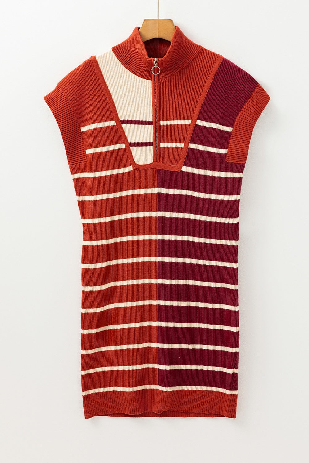 Colorblock ribbed mini dress with zip neck in terracotta, beige, and maroon stripes.