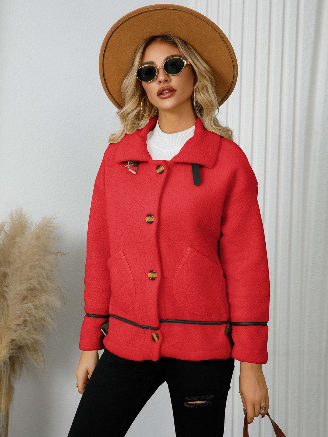 Deep Red teddy textured jacket with leatherette trim, button front, and flap pockets.