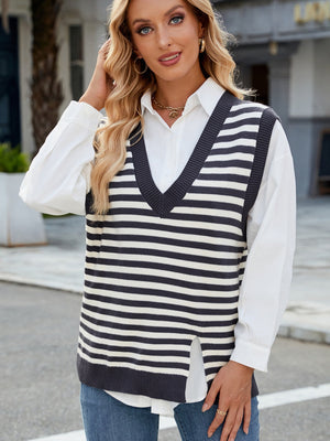 Striped knit V-neck vest with side slits, styled over a white shirt.