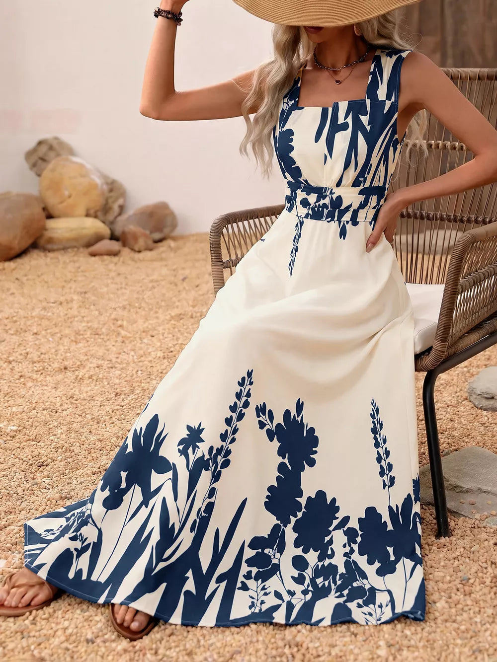 Maxi dress with botanical print, square neck, and cap sleeves.