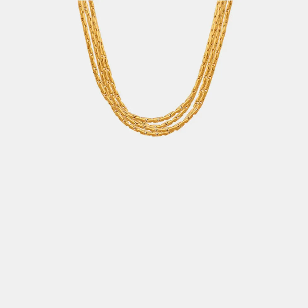 Delicate multi-strand gold-plated chain necklace with a cascading design.