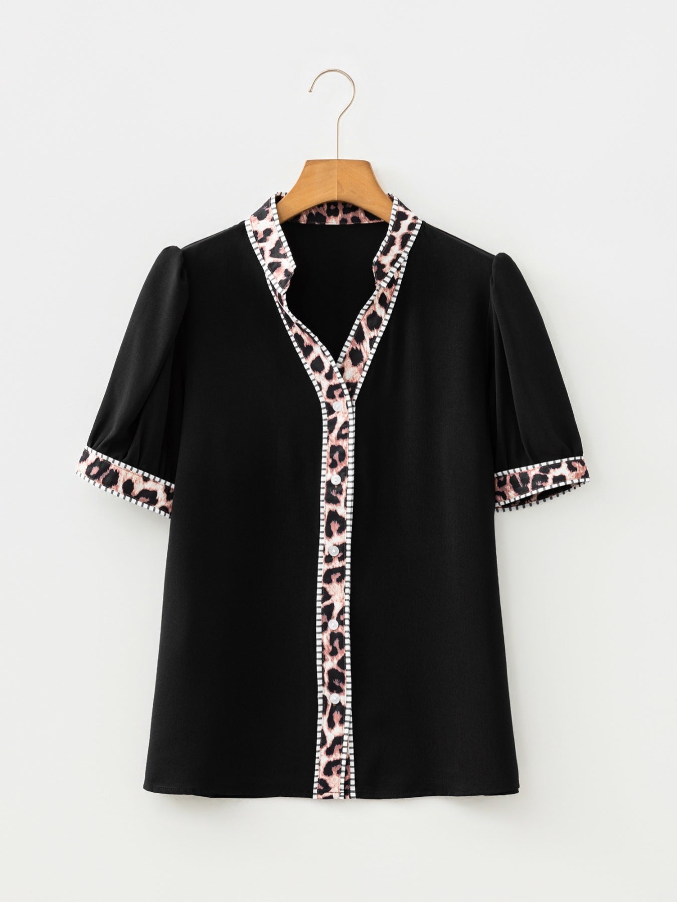 Black puff sleeve blouse with leopard trim and button front