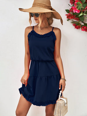 Dark blue ruffled camisole tiered mini dress with elastic waist and ruffle hem.