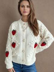 Cream knit cardigan with strawberry patches and pearl buttons