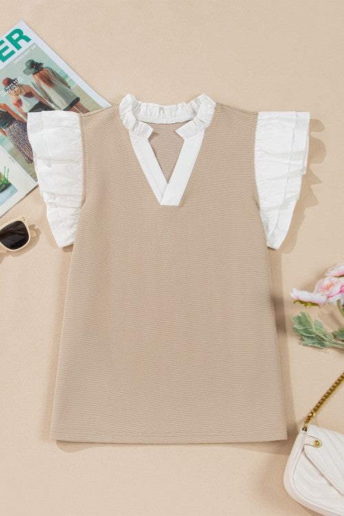 Khaki blouse with contrast white V-neck, ruffled collar, and ruffled cap sleeves.